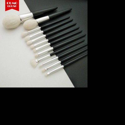 OUMO BRUSH--High end black 12pcs goat hair makeup brush set copper tube private label with power Makeup tools